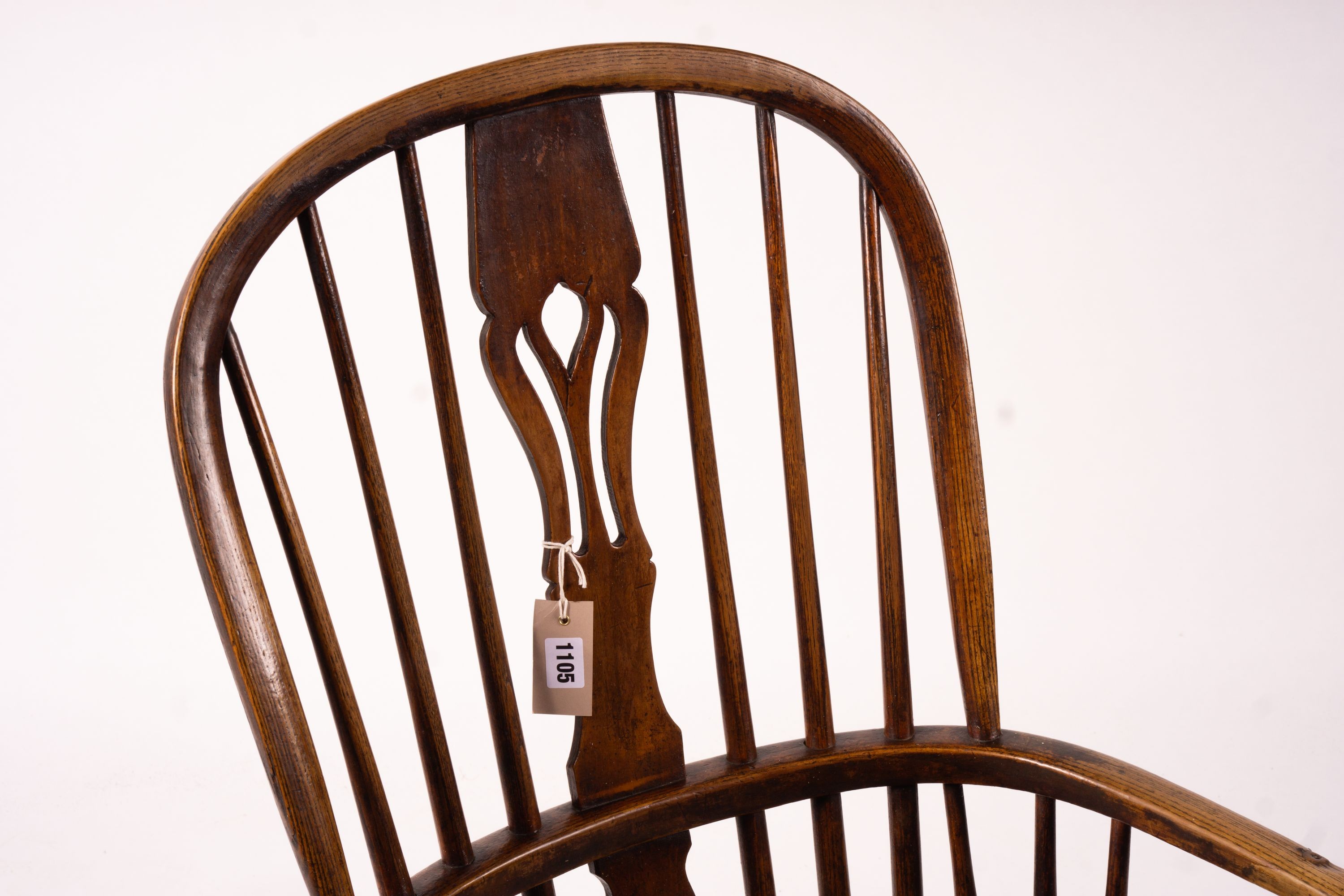 An early 19th century ash, elm and fruitwood Derbyshire area Windsor armchair with 'H' stretcher, width 56cm, depth 44cm, height 106cm